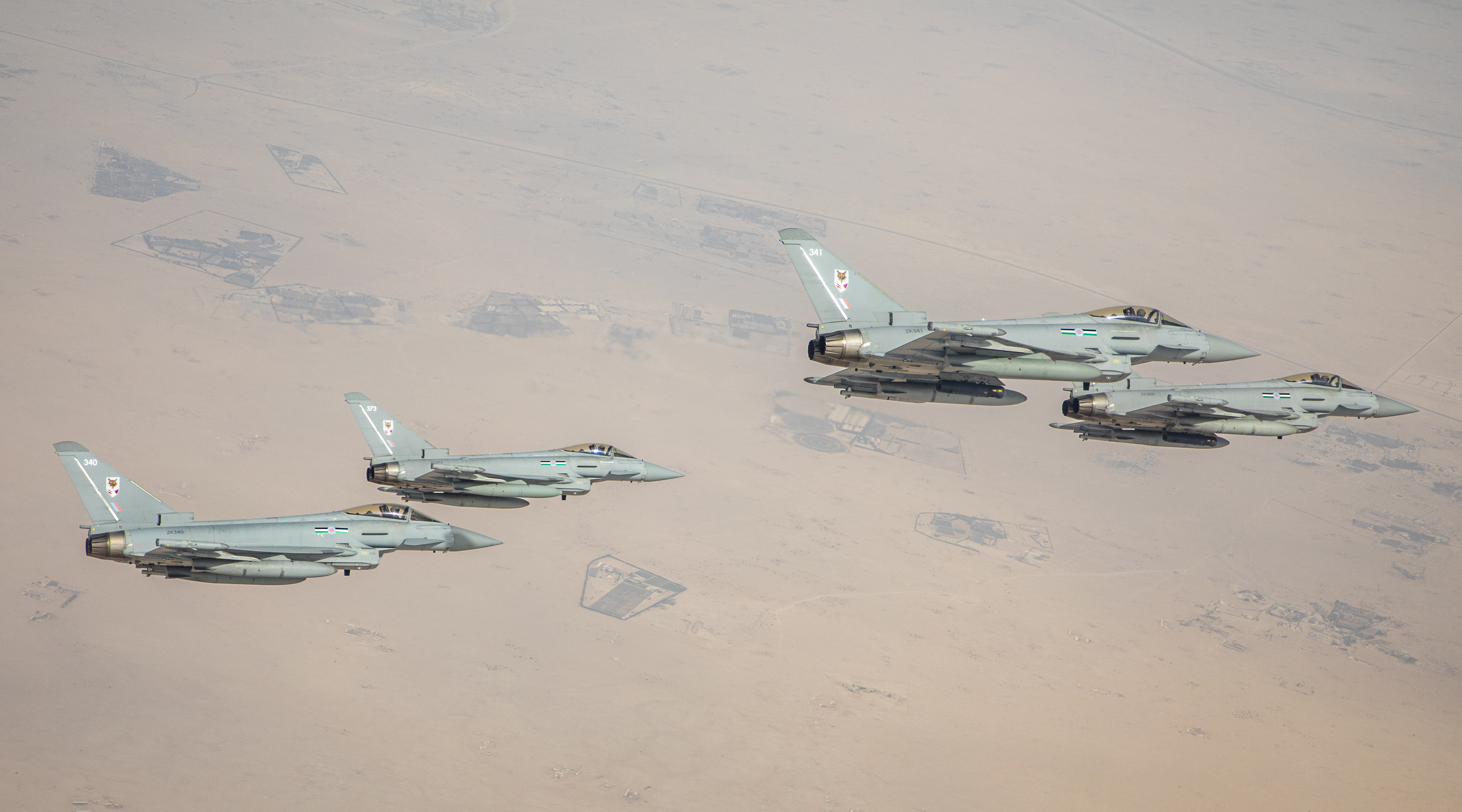 Image shows RAF Typhoon aircraft flying in formation.